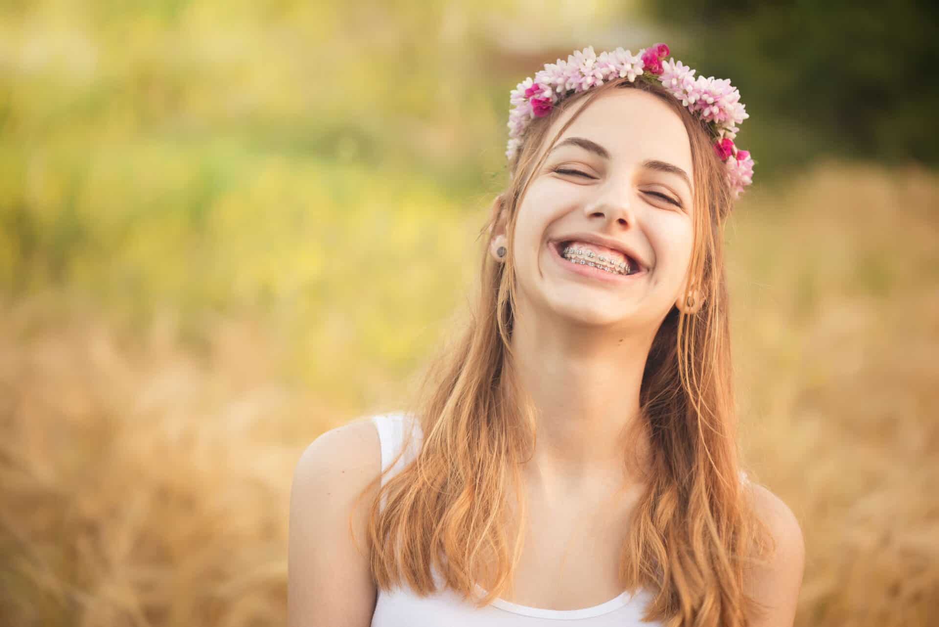 Young girl with braces enjoying summer vacation